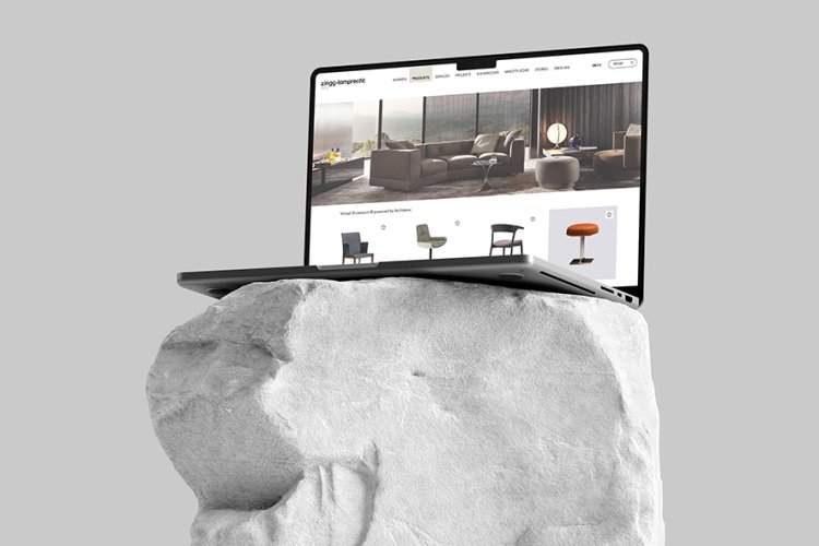 Laptop mit New Architonic auf Fels