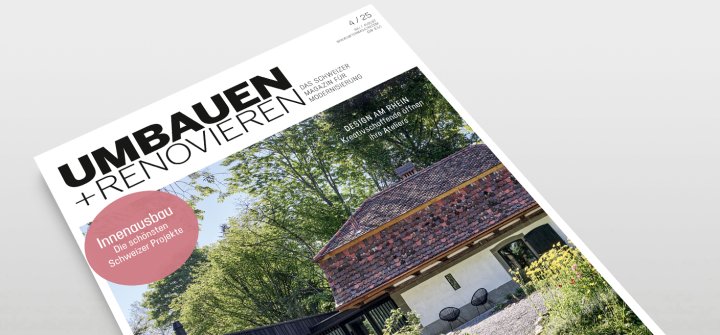 Umbauen und Renovieren Heft schräg auf grauer Oberfläche