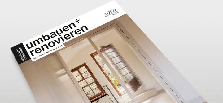 Umbauen und Renovieren Heft schräg auf grauer Oberfläche